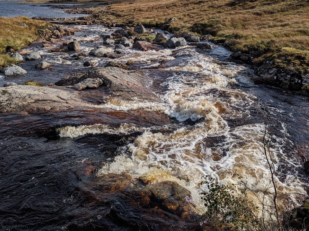 Water, rain, full and flowing